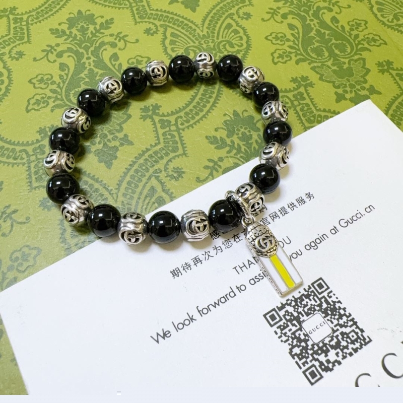 G*u*i bracelets